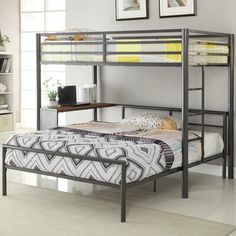 a metal bunk bed sitting in a bedroom