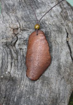 "A rare find, this outstanding and unique natural Red Cedar Tree Bark pendant have been made for you, or a loved one, in my studio on the West of Ireland. As I was walking the grounds of the old Ashford Castle in County Mayo (dating to 1228), I came across this amazing red cedar tree surrounded by its fallen thick bark....I could only find beauty in the few pieces I picked up and I knew I would work them into unique pieces of jewelry. This large Irish Tree Bark Necklace is the perfect keepsake g Artisan Natural Pendant Jewelry, Earthy Necklace With Natural Variations As A Gift, Earthy Necklace With Natural Variations For Gifts, Earthy Style Necklace With Natural Variations For Gift, Rustic Handmade Natural Jewelry, Rustic Natural Handmade Jewelry, Natural Color Pendant Jewelry Gift, Handmade Rustic Natural Jewelry, Handmade Nature-inspired Natural Jewelry