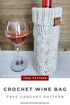 a crochet wine bag next to a glass of wine