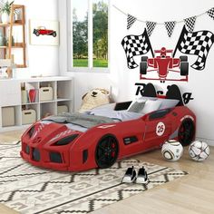 a child's bedroom with a race car bed