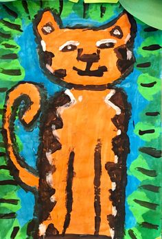 a child's drawing of a cat with green leaves on the side and blue sky in the background