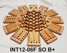 a large wooden board game with lots of holes in it