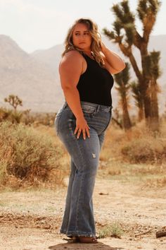 Details High rise 32" inseam Distressed knee Comfy and stretchy Care 88% Cotton 10% Rayon 2% Spandex Model's Measurements Height: 5'4", Inseam: 29.5", Hips: 55", Waist: 45", Bust: 48" Model wearing a size 16 Photoshoot Plus Size Photography Poses, Western Style Plus Size, Poses For Curvy Women, Cowgirl Illustration, Plus Size Celebrities, Plus Size Cowgirl, Plus Size Western Wear, Outfits For Curvy Women, Female Plus Size