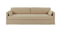 a beige couch sitting on top of a white floor