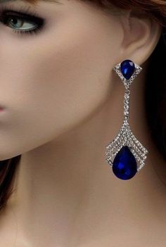 American diamond Handmade Earring Diamond-- 5.60ct diamond shape -- round American diamond  Color -- Blue  sapphire synthetic color Color -- 12.50 ct diamond shade-- white  metal--  Sterling silver  Silver Wt -- 13.800gm Earring  finishing Silver 𝒮𝒽𝒾𝓂𝓂ℯ𝓇𝒾𝓃ℊ, 𝓼𝓹𝓪𝓻𝓴𝓵𝔂 𝓪𝓷𝓭 𝓲𝓻𝓻𝓮𝓼𝓲𝓼𝓽𝓲𝓫𝓵𝓮.𝓦𝓮'𝓿𝓮 𝓰𝓸𝓽 𝓽𝓱𝓮 𝓹𝓮𝓻𝓯𝓮𝓬𝓽 𝓪𝓬𝓬𝓮𝓼𝓼𝓸𝓻𝔂 𝓽𝓸 𝓶𝓪𝓽𝓬𝓱 𝔂𝓸𝓾𝓻 𝓵𝓸𝓸𝓴 𝓽𝓸𝓭𝓪𝔂.. 𝑇𝐽 𝑓𝑟𝑜𝑚 𝑔𝑖𝑓𝑡 𝑓𝑟𝑒𝑒 𝑠ℎ𝑖𝑝𝑝𝑖𝑛𝑔 𝑠𝑝𝑒𝑐𝑖𝑎𝑙 𝑜𝑓𝑓𝑒𝑟 ✥ 𝐂𝐮𝐬𝐭𝐨𝐦𝐞𝐫 𝐜𝐚𝐫𝐞:- ➼ We Give Quick Respond On Etsy Chat By 24×7 Into 365 Days. ➼ We Give Quick Respond On Whatsapp Chat By 24×7 Into 365 Days. ➼ We Give Quick Respond On Email By 24×7 Into 365 Days. ✥ 𝐒𝐡𝐢𝐩𝐩𝐢𝐧𝐠:- ➼ Oder Shipping Is Totally Free For Our Customer. ➼ We Provide Express Shipp Elegant Blue Diamond Dangle Earrings, Blue Diamond Drop Earrings With Prong Setting, Evening Earrings With Sapphire And Diamond Accents, Evening Sapphire Earrings With Diamond Accents, Sapphire Earrings With Diamond Accents For Evening, Exquisite Diamond-accent Earrings For Party, Exquisite Diamond Accent Earrings For Party, Exquisite Diamond Accented Earrings For Party, Exquisite Earrings With Diamond Accents For Party