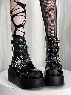 Get ready to rock the punk look with these edgy platform boots. Featuring spike studs , leather buckles, and a chunky heel, these boots are the perfect statement piece for your alternative wardrobe.  Please note that this product includes only one pair of shoes.  Garment Size   	 		 			Size 			35 			36 			37 			38 			39 			40 		 		 			Foot Length 			22.5 			23 			23.5 			24 			24.5 			25 		 		 			Heel 			4.5-7.5 			4.5-7.5 			4.5-7.5 			4.5-7.5 			4.5-7.5 			4.5-7.5 Punk Style High Ankle Boots With Rivets, Edgy High Ankle Boots With Rivets, Punk High Ankle Boots With Rivets, Punk High Ankle Platform Boots With Rivets, Punk High Ankle Moto Boots With Rivets, Punk Faux Leather Boots For Concert, Alternative Style Boots With Buckle Closure, Leather Platform Boots With Buckle For Alternative Fashion, Edgy Faux Leather Boots With Rivets