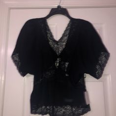 Nwt Forever 21 Top Color: Black Batwing Sleeves Lined With Lace Size: Medium Halfway Between Crop Top And Stops At Hips Another Shirt That Was Hard To Photograph, I’ll Put Up Better Photos Later Forever 21 V-neck Blouse For Night Out, Lace Top For Loungewear, Forever 21 V-neck Blouse For Date Night, Lace Top Short Sleeve For Night Out, Chic Short Sleeve Tops For Going Out, Chic Tops For Going Out With Short Sleeves, Chic Lace Top For Loungewear, Black Tops For Going Out In Spring, Forever 21 Black Fitted Blouse