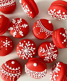 red and white decorated cookies with snowflakes on them