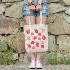 "Adorable Canvas tote for the beach, store, farmers market or any adventure. Cute Cottage Core Strawberry print, a perfect gift for garden lovers, nature lovers and anyone that loves a cute reusable tote for shopping! These Port Authority® personalized tote bags measure 15.75\"h x 15.25\"w and with a handle length of 21.5\", these strawberry tote bags are with 100% cotton sheeting. Add their reinforced handle stitching to the mix, and you got a reliable bag rich in both practicality and durability. .: Material: 100% cotton sheeting .: One size .: Lightweight and compact  .: Handle Length: 21.5\" (54.61cm)" Casual Natural Canvas Bag For Gifts, Summer Style Cotton Canvas Bag For Gift, Casual Canvas Bag Gift For Summer, Summer Casual Canvas Bag Gift, Casual Summer Canvas Bag Gift, Casual Canvas Bag For Summer Gift, Casual Canvas Bag As Summer Gift, Teacher Tote Bag, Teacher Personalized