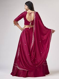 Introducing our amazing maroon gamthi work silk navratri wear lehenga choli, made with maroon satin silk material. This stunning ensemble is perfect for traditional occasions like Navratri, where you want to look elegant and festive.
Let's talk about the benefits of this beautiful lehenga choli. It is made with high-quality satin silk material, ensuring a smooth and comfortable fit. The maroon color adds a touch of sophistication and grace to the overall look. The gamthi work on the choli and at Art Silk Palazzo Set With Mirror Work For Navratri, Silk Lehenga With Gota Work For Navratri, Traditional Satin Sets For Eid, Eid Satin Sets With Dupatta, Traditional Satin Sets With Dupatta, Festive Designer Satin Sets, Bollywood Style Traditional Satin Wear, Bollywood Style Traditional Satin Drape, Eid Satin Semi-stitched Sets