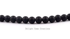 PRODUCT DETAIL : ITEM : MATTE BLACK ONYX BEADED NECKLACE ITEM CODE : DGC2355 ITEM NAME :NECKLACE GEMSTONE : BLACK ONYX BEADS SHAPE : ROUND LENGTH : 19 INCH APPROX BEADS SIZE: 12 MM Approx WEIGHT : 470 Cts. APPROX CUSTOMIZATION/BULK ORDER : AVAILABLE PLEASE FEEL FREE TO CONTACT IF YOU REQUIRE ANY FURTHER INFORMATION. Black Gemstone Beads For Jewelry Making, Adjustable Black Beaded Necklaces With Round Beads, Black Faceted Round Beads, Black Gemstone Round Beads, Black Round Gemstone Beads, Black Onyx Round Beads, Black Beaded Necklaces With Round Beads For Gift, Black Beaded Necklaces With 8mm Round Beads, Black Beaded Necklaces With 8mm Beads