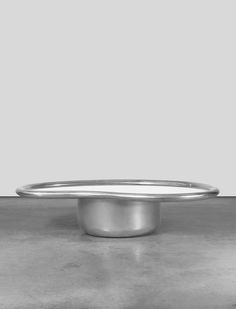 a silver plate sitting on top of a table