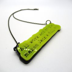 "Black and yellow laser cut acrylic pendant is designed to look like Jack's writing \"All work and no play makes Jack a dull boy\".  Hung on gunmetal necklace chain.  Clasps in back.  This is part of my limited edition fan art collection of The Shining.  All laser cut items are designed and manufactured by me." Laser Cut Necklace, All Work And No Play, Laser Cut Wood Crafts, Laser Cut Jewelry, Engraved Pendant, Laser Cut Acrylic, Lasercut Design, Leather Projects, The Shining