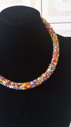 Beaded Jewelry | African Jewelry | Custom Necklace | Simple Necklace | Tribal Jewelry | Gift For Her | Women Jewelry | Gift Ideas This statement  necklace is made from  beads.Main Color - Rainbow.Available in different colors.Feel free to send me a convo or e-mail for any clarification or more information.Thank you for visiting, Multicolor Beaded Choker With Round Beads, Rainbow Beaded Choker With Round Beads, Handmade Rainbow Choker With Round Beads, Multicolor Spacer Beads Choker Necklace, Multicolor Choker Necklace With Spacer Beads, Multicolor Large Beads Choker, Handmade Colorful Choker With Round Beads, Handmade Rainbow Choker Beaded Necklaces, Handmade Rainbow Beaded Choker Necklaces