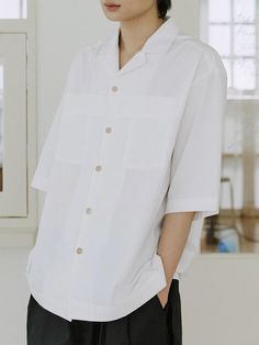 This is a minimal and casual shirt that is made out of high quality cotton 100% fabric. With eco friendly cotton fabric that has a soft touch and natural wood buttons, it is comfortable to wear in a daily life. - Natural wood buttons- Folding design above the pocket- Eco friendly cotton fabric Minimalist Cotton Summer Shirt, Minimalist Summer Cotton Shirt, White Collared Short Sleeve Shirt For Everyday, Modern White Cotton Short Sleeve Shirt, Modern White Short Sleeve Cotton Shirt, White Short Sleeve Button-up Shirt For Everyday, Everyday White Short Sleeve Button-up Shirt, White Relaxed Fit Minimalist Shirt, Modern White Shirt For Everyday