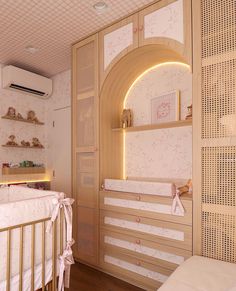 a baby's room with a crib and shelves on the wall next to it