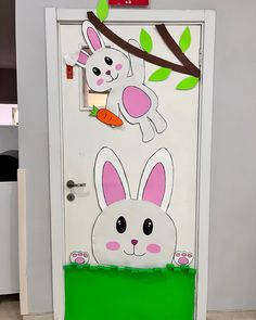 a door decorated with an image of a bunny and carrot