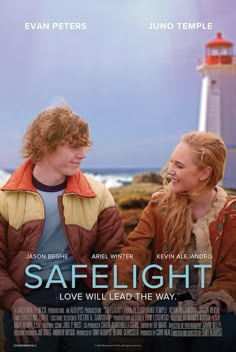 the poster for safelight is shown with two people sitting next to each other and looking at each other