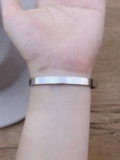 This bar bracelet is a great everyday piece. available in silver and rose gold. Dimensions: 4" DiameterClosure: n/a Minimalist Silver Stainless Steel Bracelet, Stainless Steel Cuff Bracelet For Everyday, Modern Silver Friendship Bracelets, Minimalist Round Stainless Steel Bracelets, Everyday Stainless Steel Cuff Bracelet, Minimalist Stainless Steel Cuff Bracelet, Rose Gold Metal Bangle For Everyday Wear, Minimalist Everyday Bracelet With Stainless Steel Clasp, Silver Bangle With Bracelet Strap For Everyday