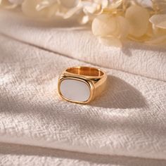 The Golden Mother of Pearl Ring exudes luxury and elegance with its unique combination of mother of pearl and gold. Each golden mother-of-pearl is carefully selected and finished to give a gem-like lustre and layered look. The yellow gold surround adds to the splendour of the ring, showcasing a regal aura. Whether paired with everyday décor or special occasions, the gold mother-of-pearl ring offers a uniquely stylish and sophisticated wearing experience. ♥Thank you for choosing us, all of our pi Classic White Pearl Open Ring, Elegant White Enamel Ring For Gift, White Gold Plated Open Ring, Luxury White Pearl Open Ring, Elegant White Enamel Wedding Ring, Gold Minimalist Pearl Ring, Minimalist Gold Pearl Ring With Detail, Minimalist Open Ring In Pearl White, White Pearl Open Ring