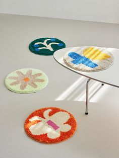 four circular rugs on a table with the words circle rug ver 2 above them