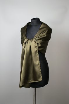 A very elegant satin shawl for your wedding party or evening dress. Made of luxury heavy satin, slightly sparkles on the sun or light. Color: khaki green ( other colors are available ) Size : 180 cm x 40 cm You can use it as a wrap, shawl or stola. WE have matching satin bags in Etsy Shop! WE accept credit cards! Elegant Gold Scarf For Wedding, Formal Solid Color Satin Scarves, Elegant Satin Scarves As Gifts, Elegant Gold Silk Scarf For Evening, Classic Silk Scarf For Weddings, Classic Silk Scarf For Wedding, Evening Silk Scarf With Satin Finish, Formal Satin Scarves With Satin Finish, Elegant Silk Scarf With Satin Finish