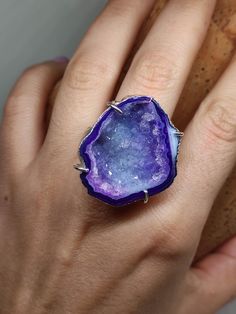 Introducing our stunning Geode Rings - nature's hidden treasures transformed into exquisite jewelry! Each Geode Ring showcases the unique beauty of geodes, with their captivating crystals and vibrant colors. Elevate your style and connect with the Earth's natural wonders. Discover the magic of geodes with our Geode Rings today! 🔸Adjustable band ring  🔸30mm stone size 🔸Color may vary according to lighting 🔸Silver filled We offer  🔸Fast shipping  🔸Free shipping eligible orders  🔸Polishing c Large Geode, Rock Ring, Rough Stone Ring, Geode Ring, Rock Rings, Cool Rings, Raw Crystal Ring, Rings Cool, Crystal Ring