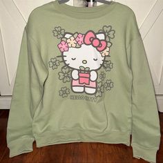 Bnwt Hello Kitty Olive Sweatshirt In Size Small Features Hello Kitty Gardening With A Potted Plant And Flowers All Around Her! Experienced Shipper With The Reviews To Show It! Shipped With Love And Care As Well As Tons Of Bubblewrap Tiktok Famous And Very Hard To Find After Going Viral Trending Hello Kitty Blankets Hello Kitty Throws Valentines Easter Hello Kitty Pinkmas Home Goods Tj Maxx Rae Dunn Cupcakes And Cashmere Throw Tiktok Viral Holiday Present Gift Gingerbread Love Xoxo Valentines Rae Casual Pink Hello Kitty Sweatshirt, Casual Pink Sweatshirt With Hello Kitty Print, Hello Kitty Print Crew Neck Cotton Sweatshirt, Spring Kawaii Sweatshirt With Cartoon Print, Spring Kawaii Cartoon Print Sweatshirt, Cotton Crew Neck Sweatshirt With Hello Kitty Print, Green Kawaii Tops For Spring, Cute Cotton Sweatshirt With Hello Kitty Print, Pink Hello Kitty Print Crew Neck Sweatshirt