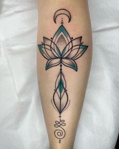 a woman's leg with a lotus tattoo on it