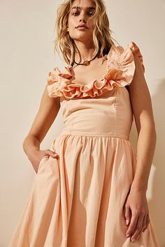 Effortlessly ethereal, this sweet midi from our free-est collection is the perfect romantic look. **Fit:** A-line silhouette with slim fit bodice **Features:** Exaggerated ruffled square neckline, billowy skirt design, tie-back closure **Why We | Ruffle It Up Midi Dress by free-est at Free People in Pink, Size: L Feminine A-line Midi Dress With Ruffle Hem, Feminine Bridesmaid Dresses With Ruffled Straps, Feminine Dresses With Fitted Bodice And Ruffled Straps, Bridesmaid Midi Dress With Sweetheart Neckline And Ruffles, Flirty A-line Midi Dress For Brunch, Chic Midi Dress With Ruffle Hem And Fitted Bodice, Sweetheart Neckline Midi Dress With Ruffles For Day Out, Flirty Midi Dress With Ruffles And Fitted Bodice, Spring Flirty Midi Dress With Fitted Bodice