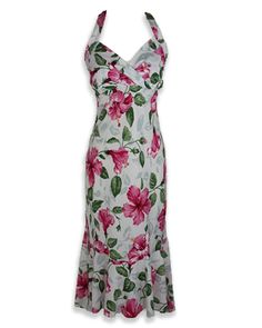 a white dress with pink flowers on the front and green leaves on the back,