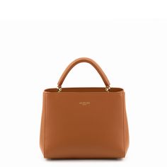 Named after the Roman Piazza with the most beautiful architectural monuments in the world, the Navona handbag is handcrafted using Ruga calf leather. This bag is a compact and versatile piece with perfect geometry and modern lines. It is light enough to carry all day long, by hand, on the shoulder or worn cross-body using the detachable strap. The closer features a flap that magnetically secures inside. This bag comes in a variety of colours chose from a classic Black, Red, Taupe, Camel and Pink Classic Leather Bag, Italian Leather Handbags, Timeless Bags, Designer Leather Handbags, Italian Bags, Mens Leather Bag, Mens Leather, Classic Leather, Best Fashion