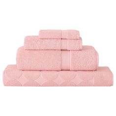 pink towels stacked on top of each other