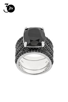 8.92ct rectangular cushion and 2.24ctw round black spinel rhodium over sterling silver ring with two bands set. The center ring measures approximately .88"L x .55"W. Each band measures approximately .87"L x .13"W each. Not sizeable. Black rhodium.