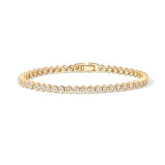 PRICES MAY VARY. Honeycomb tennis bracelet featuring round 2mm cubic zirconia stones in six-prong basket settings. Measures 6.5 inches in length. Cubic Zirconia set in Lead-free, Eco-friendly and hypoallergenic setting. This stunning bracelet is then 14K Gold Plated to ensure a long-lasting and brilliant finish. ✦ 60-DAY GUARANTEE ✦ Your happiness is our number one priority. To ensure your complete satisfaction, we offer a hassle-free 60-Day money-back guarantee. To get in touch, email or chat w Tennis Bracelet Gold, Solitaire Bracelet, Expensive Diamond, Dainty Gold Jewelry, Jewelry Fashion Trends, Gold Bracelet For Women, Jewelry Images, Gold Bracelets, Bracelet Collection