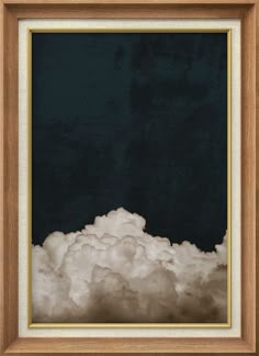 an image of clouds in a wooden frame