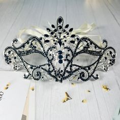 Durable Quality: This Crystal Masquerade Mask Is Made Of High-Quality Alloy And Rhinestone Diamond. They Are Manual Workmanship, Very Comfortable To Wear. Elegant Design: The Masquerade Mask Is Encrusted Shinny Diamond Rhinestone And Crystal. The Intricate And Delicate Are Very Glamorous, Elegant And Luxury. Princess Style: You Will Be The Center Of Attraction At Party When You Wear The Princess Style Fancy Mask. Various Occasion: The Masks Are Perfect For Masquerade Party, Festivals, Carnival T Black Adjustable Masquerade Mask For Party, Adjustable Black Masquerade Mask For Parties, Elegant Black Masquerade Mask For Party, Elegant Masquerade Mask For Formal Occasions, Silver Formal Masquerade Mask For Carnival, Elegant Black Masquerade Mask As Gift, Elegant Black Masquerade Mask For Gift, Elegant Silver Masquerade Mask, Elegant Silver Masquerade Mask For Wedding