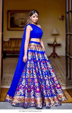 Bollywood Replica Lehenga*Lehenga in Semi-Stitched Banarasi silk fabric with Zari Weaving Work and Waist Support Up To 42  and skirt attached With Canvas ,Lehenga Closer using Drawstring with Length approximately in 41 inches and Flair in 3.5  Meter.Inner in Micro Cotton.Blouse And Dupatta Stitched.Blouse Fabric in plain Georgette with Blouse Pattern in Heart Shape and Blouse Size *Fully Stitched* Size is 38 there Extra Margin So  Can Adjust size from 36" to 42" and *Also att Latest Lahengas, Royal Blue Lehenga, Pola Blus, Western Lehenga, Brocade Lehenga, Mehndi Dresses, Sabyasachi Lehenga, Lehenga Choli For Women, Choli For Women