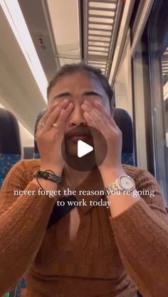 a woman covering her eyes while riding on a train with the caption never forget the reason you're going to work today