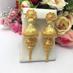 Handmade Jhumka Earrings 22ct Micro Gold Plated Earrings Indian jewelry Pakistan Jewelry  Length:3.5"Inches Approx  Traditional Indian Wedding Jewellery Slight Colour variations possible due to difference in screen and photograph  It is a perfect match with formal attire on special occasions or with casual wearing Care instructions Keep Jewellery away from direct heat, water, perfumes, deodorants and other strong chemicals as they may react with the metal or plating. The plating composition of J Heavy 22k Gold Earrings For Puja, 22k Gold Jhumkas With Latkans For Navratri, Gold Plated Jhumkas For Puja, 22k Gold Bollywood Earrings For Puja, Traditional Gold Plated Jhumkas For Puja, Gold Bollywood Jhumkas For Puja, 22k Gold Jhumkas With Latkans For Celebration, Bollywood Style Yellow Gold Jhumkas For Puja, Traditional Heavy 22k Gold Danglers