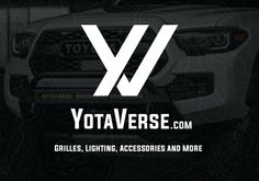 the front end of a white truck with an x on it's side and words yotaverse com