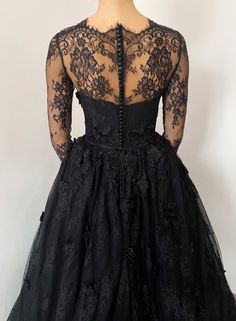 Made to order! Black tulle and lace floral dress. Bodice decorated with 3D flowers. Boned corset, back has lacing for support and button closure. Long lace sleeves. This dress is 2in1. It comes with detachable long train skirt. ( choose in the drop down either you want just the dress or dress + lace skirt). Long train lace skirt is also decorated with 3D flowers. After you place the order, I will contact you and send the list of measurements I need. Along with instructions on how to take them! I Black Lace Dress For Debutante Ball, Halloween Prom Tulle Dress, Lace Corset Ball Gown Dress For Prom, Lace Corset Ball Gown For Prom, Lace Ball Gown Corset Dress For Prom, Lace Ball Gown With Corset Back For Prom, Lace Ball Gown With Corset Back For Prom Season, Gothic Lace Corset Wedding Dress, Gothic Lace Corset Dress For Wedding