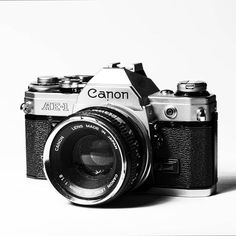 a black and white photo of a camera