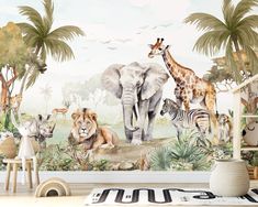 an animal mural in a children's room with zebras and giraffes