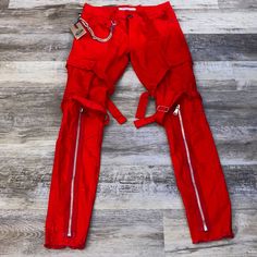 Brand New With Tag. Great Trend . Chain Rope Pocket . Pants Are Very Cool . Zipper Front Bottom Look . Denim Pants . Men’s Size 30. Cotton Mixed With Spandex Material . Has One Small White Stain On Back Bottom Leg *** Last Pictures Red Fitted Denim Bottoms, Fitted Red Denim Bottoms, Red Cotton Pants With Cargo Pockets, Red Cotton Cargo Pants, Red Cotton Jeans With Pockets, Fitted Red Jeans With Pockets, Fitted Red Jeans, Red Cotton Jeans For Streetwear, Red Cotton Pants With Belt Loops