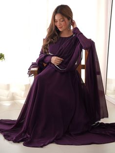 Introducing our stunning "fascinating purple georgette festival wear gown with dupatta" - the perfect outfit for all your festive occasions. This beautiful purple gown is made of high-quality georgette fabric with intricate lace work, giving it an elegant and sophisticated look. The gown is fully stitched and comes in sizes ranging from XS to XXL, ensuring a perfect fit for everyone.
This ensemble include a purple color georgette gown with lace work, a similar color cotton pant, and a georgette Formal Georgette Dresses With Dabka, Formal Georgette Dress With Dabka Detailing, Unstitched Purple Salwar Kameez For Reception, Purple Anarkali Set With Dabka Work For Reception, Elegant Unstitched Purple Dress, Elegant Purple Dabka Salwar Kameez, Formal Gown In Georgette With Traditional Drape, Formal Georgette Gown With Traditional Drape, Purple Anarkali Dress With Dabka Work