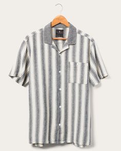 Time for a stripe-tease. This linen/rayon blend is lightweight for warm weather, and its one-pocket camp style pairs perfectly over your old concert tee. Striped Short Sleeve Shirt With Camp Collar For Spring, Relaxed Fit Tops With Vertical Stripes And Camp Collar, Cotton Camp Collar Top With Vertical Stripes, Spring Striped Short Sleeve Shirt With Camp Collar, Cotton Top With Vertical Stripes And Camp Collar, Casual Shirt With Vertical Stripes And Camp Collar, Striped Collared Cotton Camp Shirt, Striped Shirt With Camp Collar And Relaxed Fit, Striped Short Sleeve Cotton Shirt With Relaxed Fit