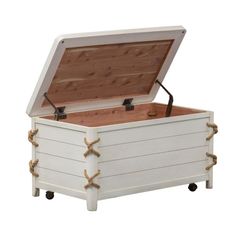 an open white chest with rope handles