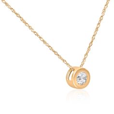 This classic women's solitaire pendant features one round brilliant cut natural diamond.  The diamond is bezel set in solid 14k yellow gold.  An 18" 14k yellow gold chain is included. Diamond Flower Pendant, Solitaire Diamond Pendant, Round Solitaire, Solitaire Pendant Necklace, Diamond Pendants, Gold Jewelry Simple, Bezel Pendant, Heart Pendant Diamond, Diamond Necklaces