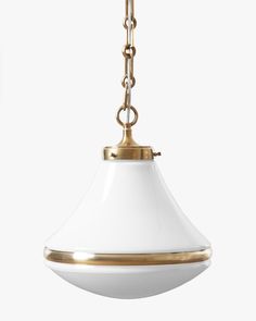 a white and gold pendant light hanging from a chain